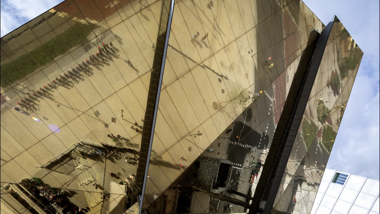Timelapse of the encants second hand market with gloden reflecting roof in barcelona
