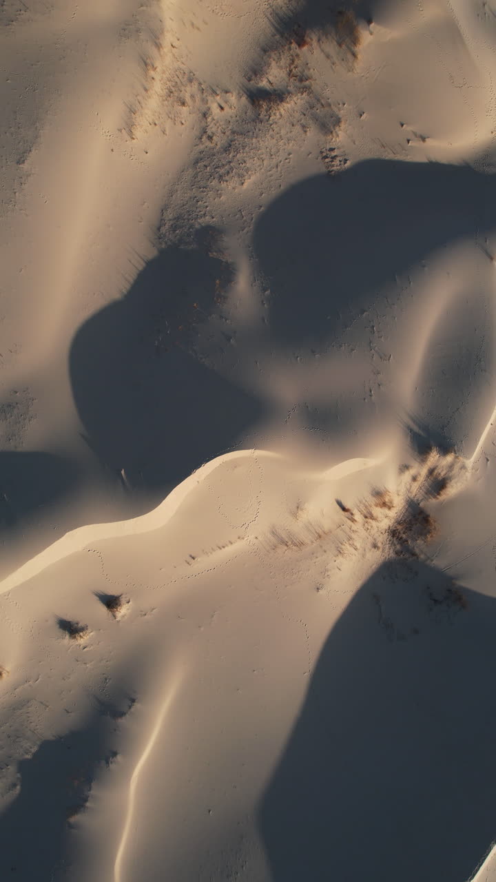 Aerial View of Sand Dunes with Shadows
