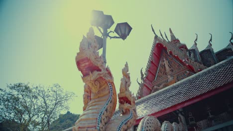 Dragon-sculpture-by-the-entrance-to-a-temple-in-Thailand