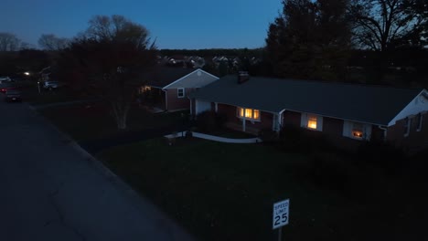 Car-driving-in-dark-neighborhood