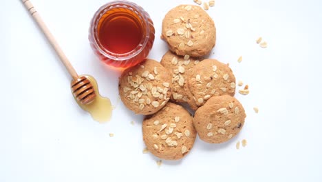 stack of chocolate cookies on wooden background.