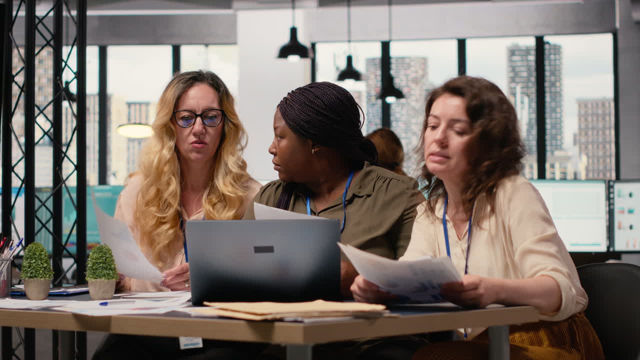 Vertical Video Multiethnic businesswomen exchange insights and challenge ideas