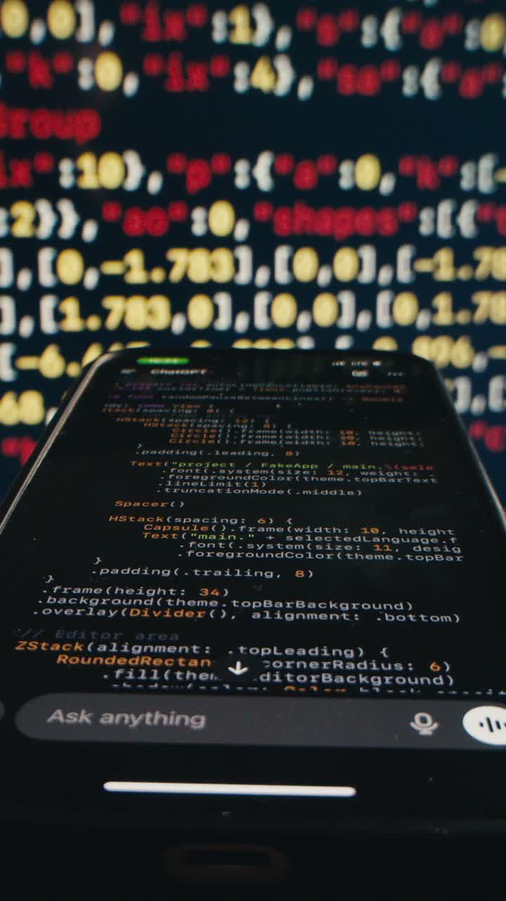 Developer's Hand Scrolling Code on a Smartphone Display