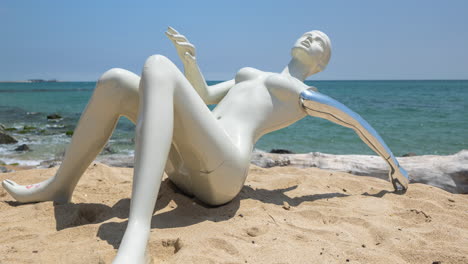 mannequin on a beach