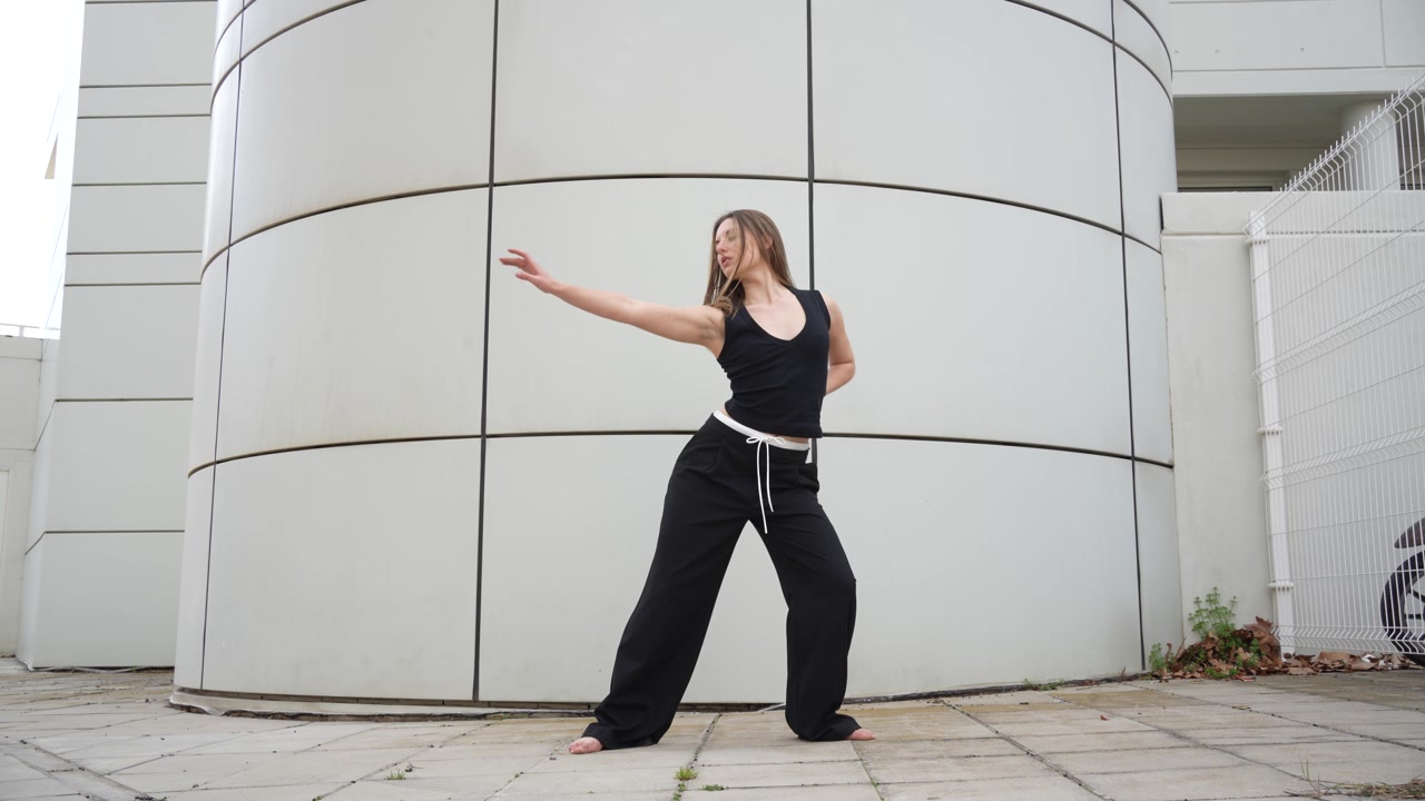 Dynamic and expressive dance poses set against stunning modern architecture backdrops