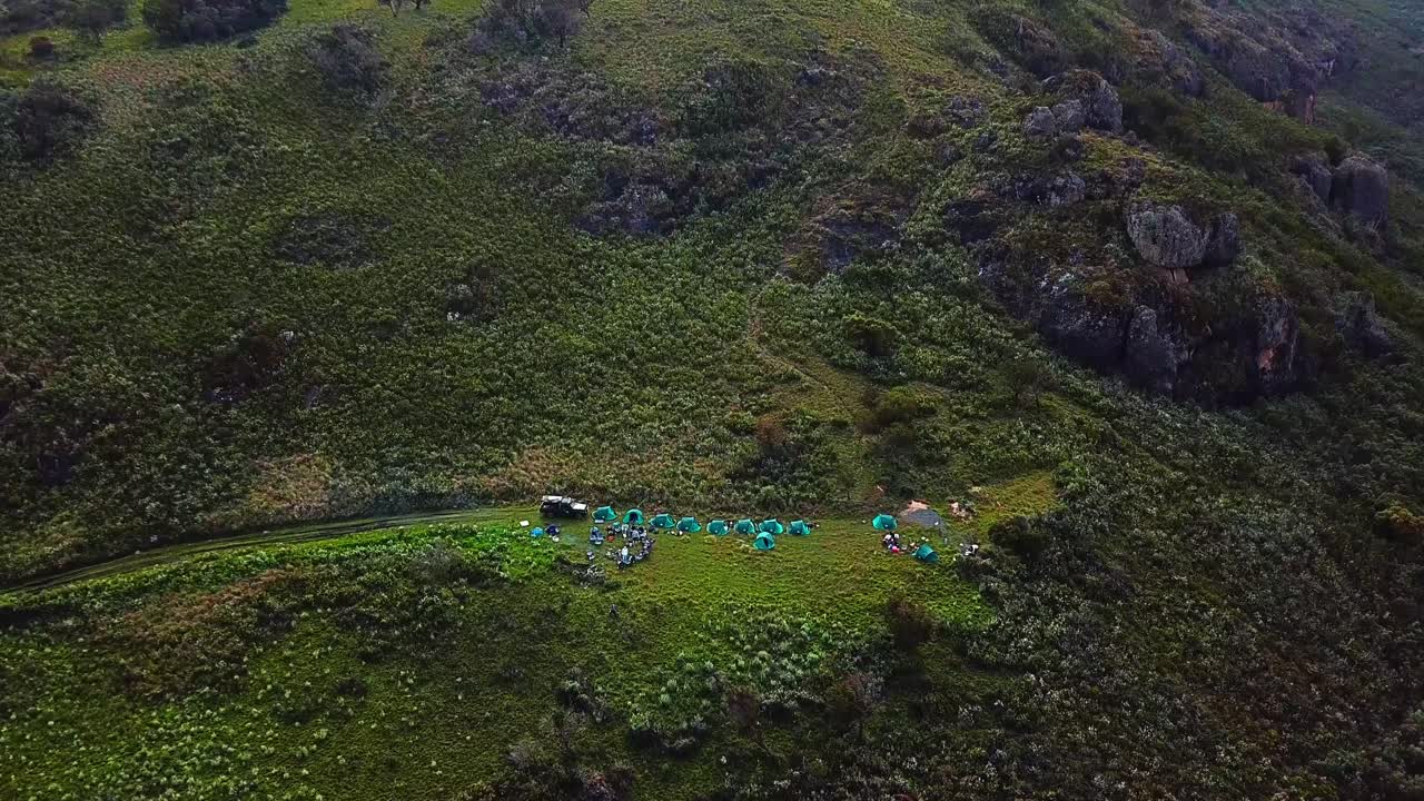 Campers And Tents Along Trekking Circuit Of Mount Elgon In Uganda-Kenya Border In Africa. aerial drone