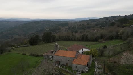 Hilltop-San-Fiz-de-Navío-Church,-San-Amaro,-Scenic-View,-Spain---aerial-panoramic