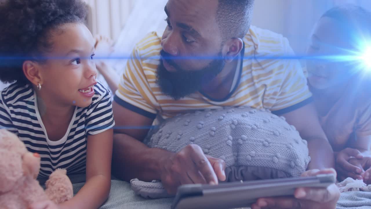 Father tapping tablet and teaching children in cozy home, animated educational graphics appearing