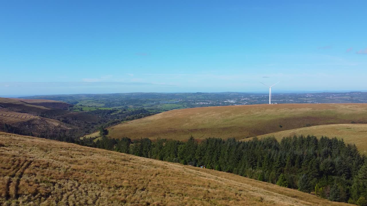 Aerial View of Wind Turbine on a Hilltop