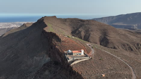 Panoramic-and-orbital-aerial-view-of-the-Temisas-astronomical-observatory-and-the-mountain-where-it-is,-in-the-municipality-of-Aguimes