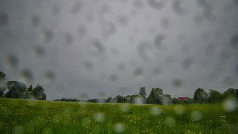 Time-lapse-shot-of-dark-clouds-at-sky-with-rain-in-lens-in-nature-changing-to-clear-sky-with-epic-golden-sunset-and-blue-night-sky