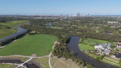 scenic aerial view of parklands and city skyline