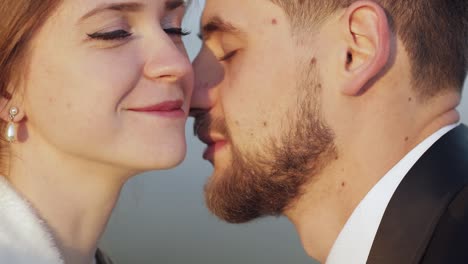 Newlyweds.-Caucasian-groom-with-bride-on-the-morning-field.-Fog.-Wedding-couple