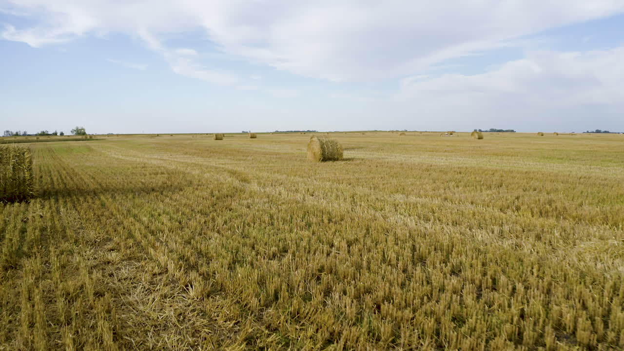 Drone fly's past hay bales in North Dakota Plains