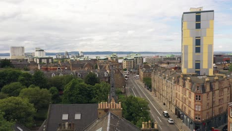 An-aerial-shot-revealing-rooftops-and-old-chimneys-|-The-docks-of-Leith,-Edinburgh,-Scotland-|-Shot-in-4k-at-30-fps