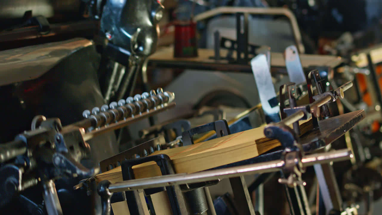 Mechanical Printing Press Feeding Sheets of Paper