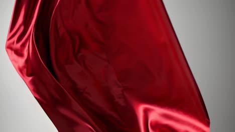 drapeado de tela de satén rojo