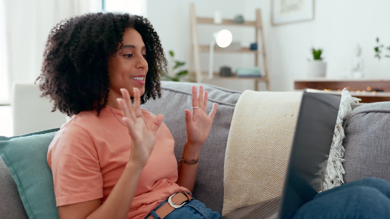 Laptop, video call and woman talking on sofa