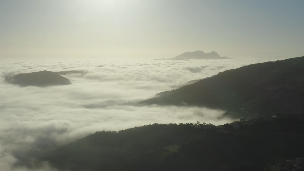 Sea Of Clouds With Forest Mountains On A Misty Morning In Sardinia Island, Italy. - Aerial Shot