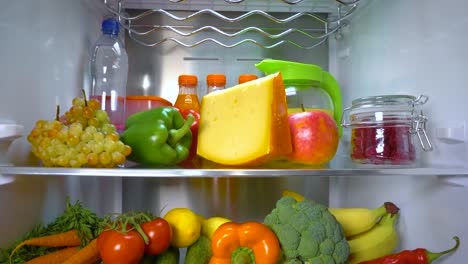 open refrigerator filled with food