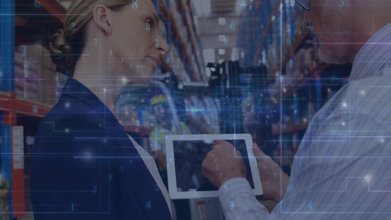 Manager scrolling tablet with animated warehouse data for task while woman nodding beside forklift