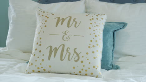 mr and mrs pillow in bridal suite hotel room in the honeymoon