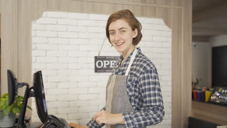 happy cashier at a cafe