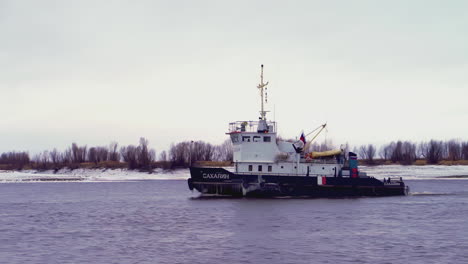 tugboat on a frozen river