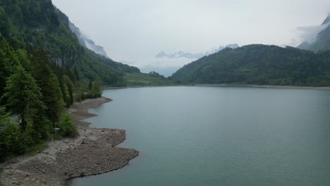 Aerial-view-of-great-Klöntalersee-lake,-Glarus-Canton,-Switzerland