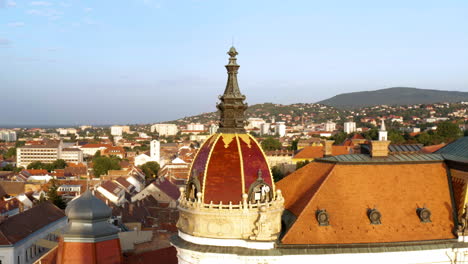 Red-Painted-Dome-Of-Pecs-County-Hall-Building-At-The-Szechenyi-Square-In-Pecs,-Hungary