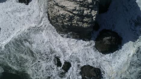 Sheer-Coastal-Cliffs-With-Breaking-Waves-In-South-Chile