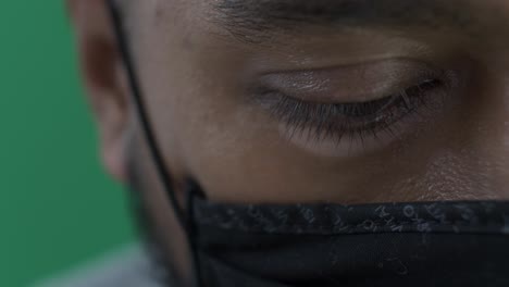 Blinking-Asian-Male-Right-Eye-Close-Up-Wearing-Face-Mask