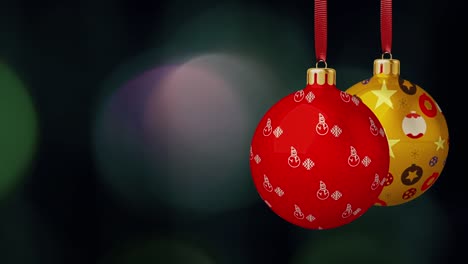 christmas ball ornaments are swinging on bokeh background loopable file