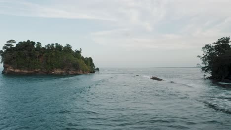 Scenic-Sea-Waves-At-Punta-Mona-Islands-With-Lush-Trees-In-Costa-Rica