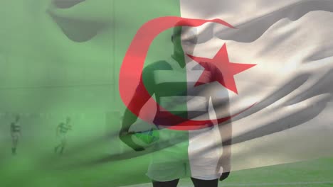 animation of flag of algeria over african american male rugby players at stadium