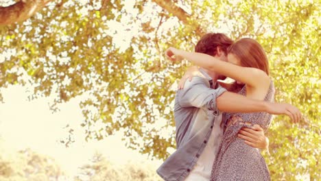 Cute-couple-hugging-in-the-park