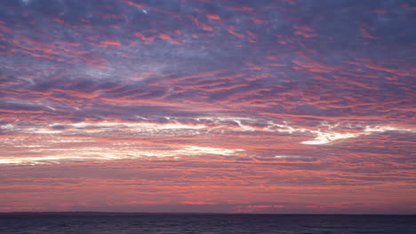 Stunning-View-Of-The-Sunrise-Sky-Scattering-Over-The-Bantayan-Island-In-Cebu,-Philippines---timelapse