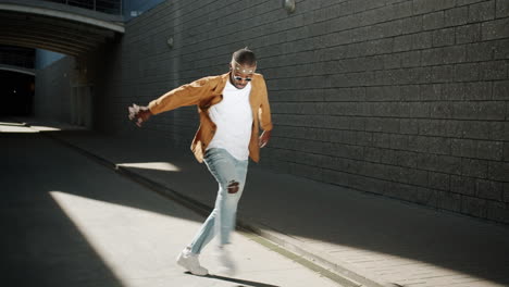 man dancing in urban setting