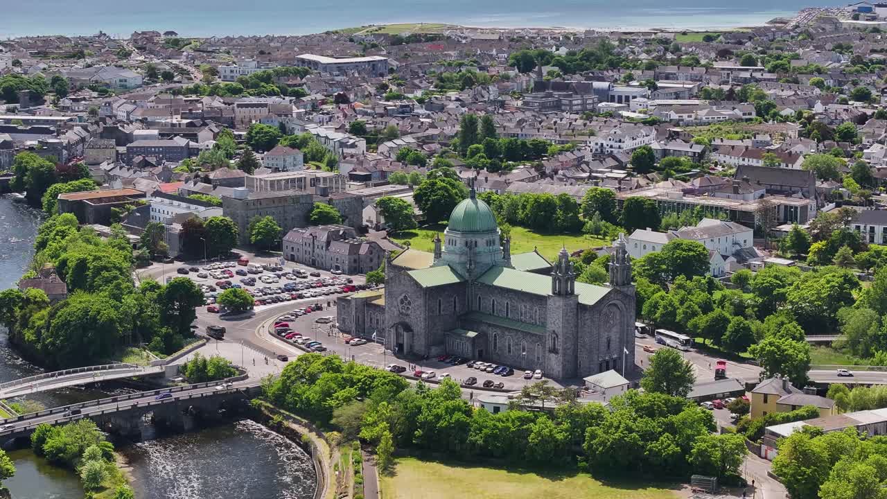 Amazing drone of Galway Cathedral one West Coast Ireland. Historical landmark on riverside.