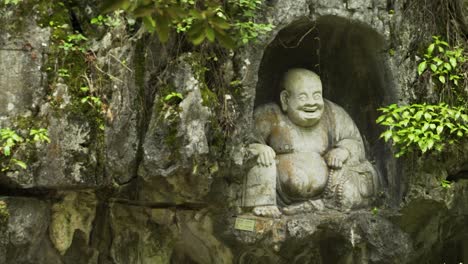 ancient buddha siddhartha gautama rock carving in a temple hangzhou china