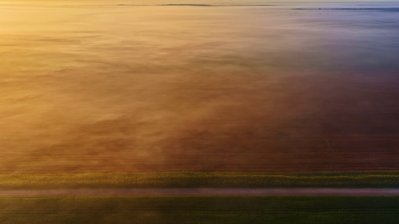 Lonely road landscape sky gradient colour mist fog morning layer, aerial countryside road trip