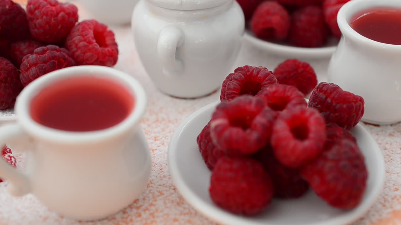 Rotation shot of Raspberry and jam, still life. Shooting in the movement