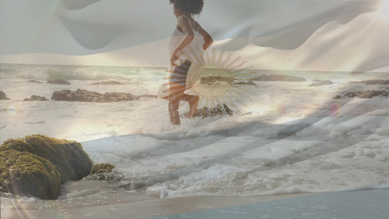 Running on beach, person with Argentine flag animation overlay in scene
