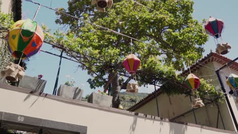 colorful balloon decorations in a european village