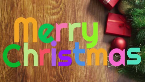 Animation-of-merry-christmas-text-over-presents