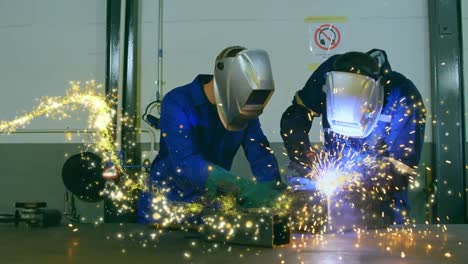 animation of glowing shooting star over male engineers welding