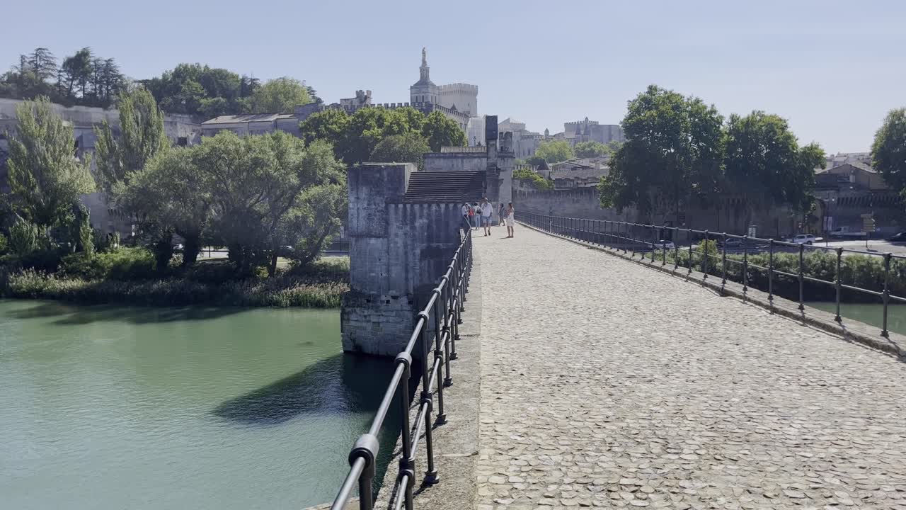 Bridge of Avignon View of the French city on the river with historic buildings in good weather