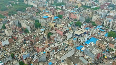aerial view densely populated area in city of new delhi in india - tilt up