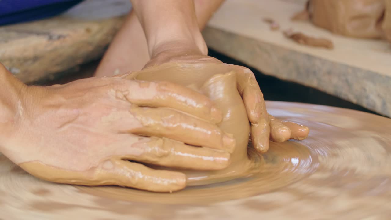 Pottery making on a pottery wheel