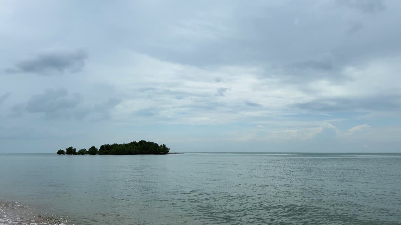 Malacca Strait in Malaysia Port Dickson calm ocean sea water, cloudy sky